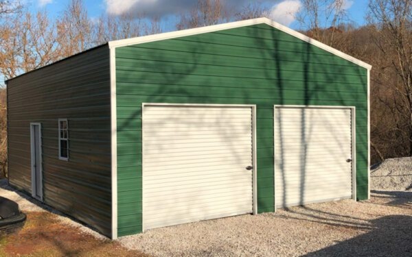 Green steel double-door garage built by Greg Builds in NY