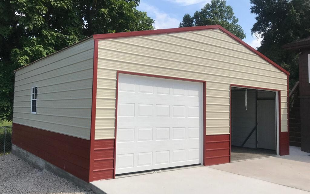 Steel garage on a rural property surrounded by trees built by Greg Builds in Western New York