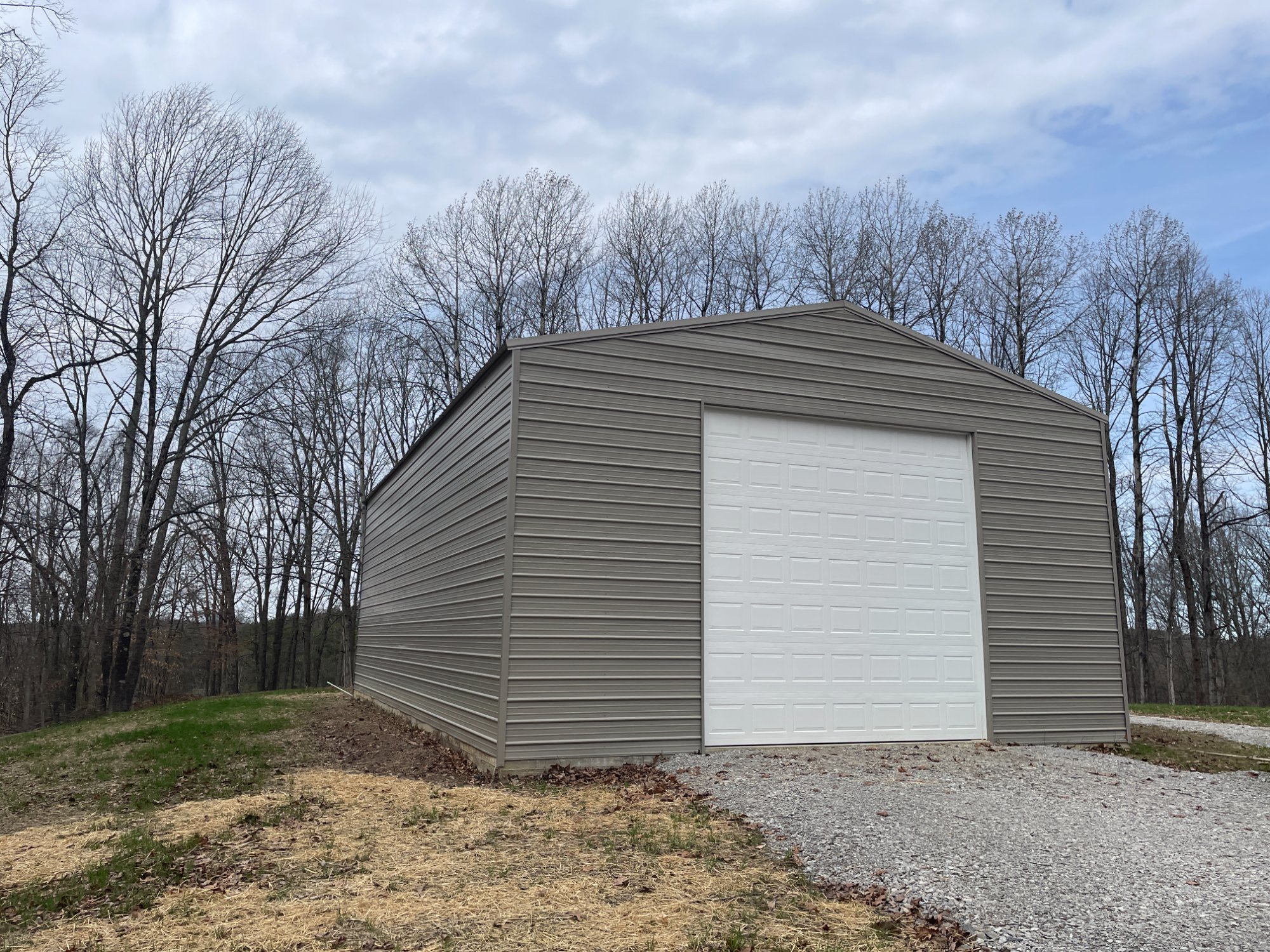 Residential steel garage with overhead door in Western New York